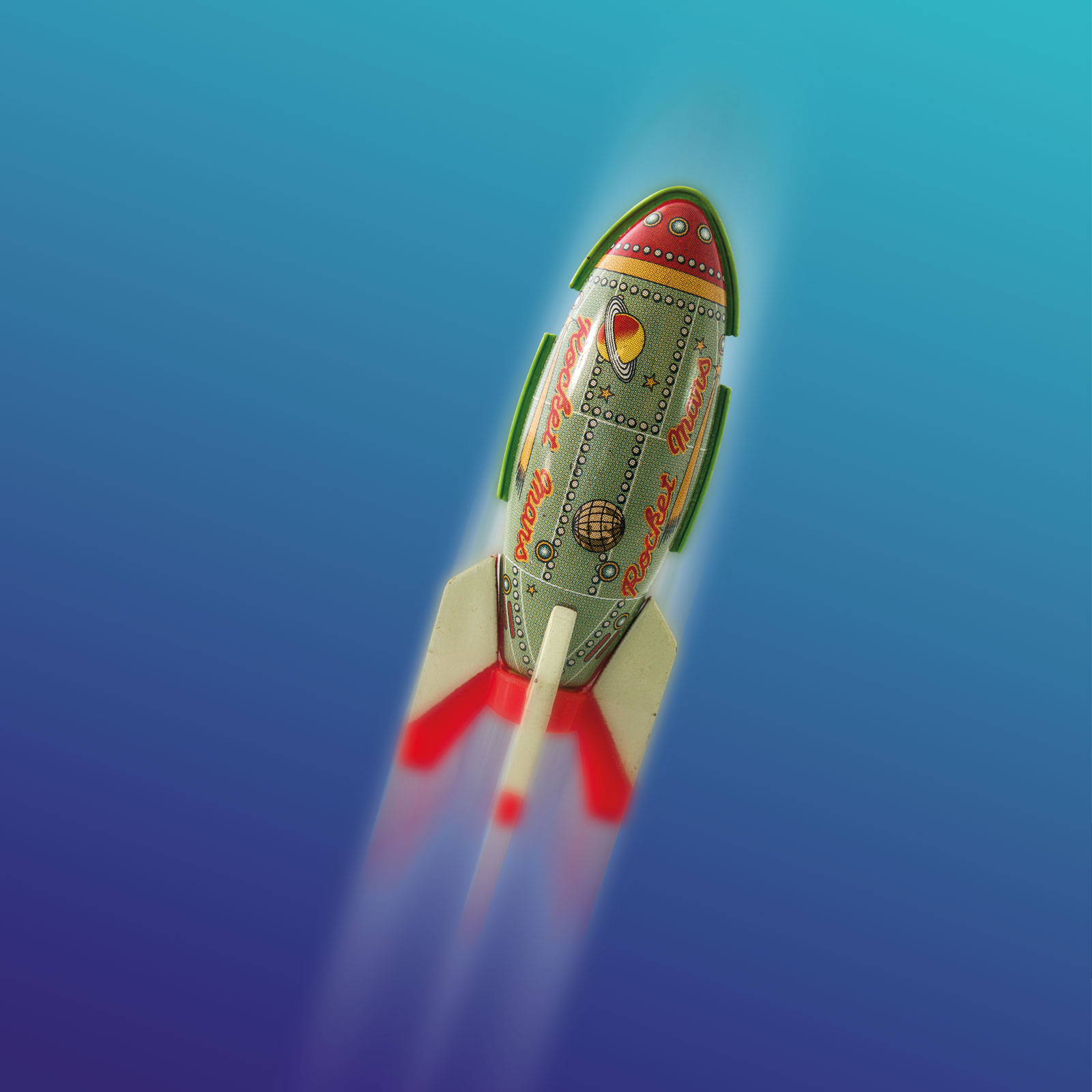 illustrazione razzo verde e rosso su sfondo azzurro sfumato
