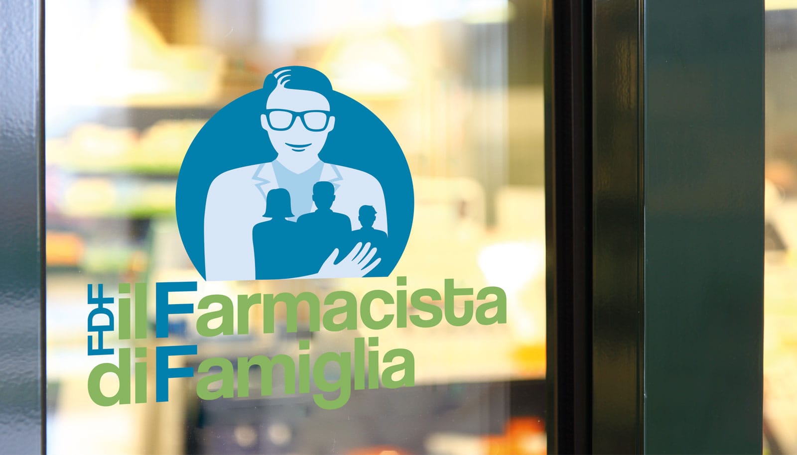 adesivo su vetrina farmacia con logo farmacia